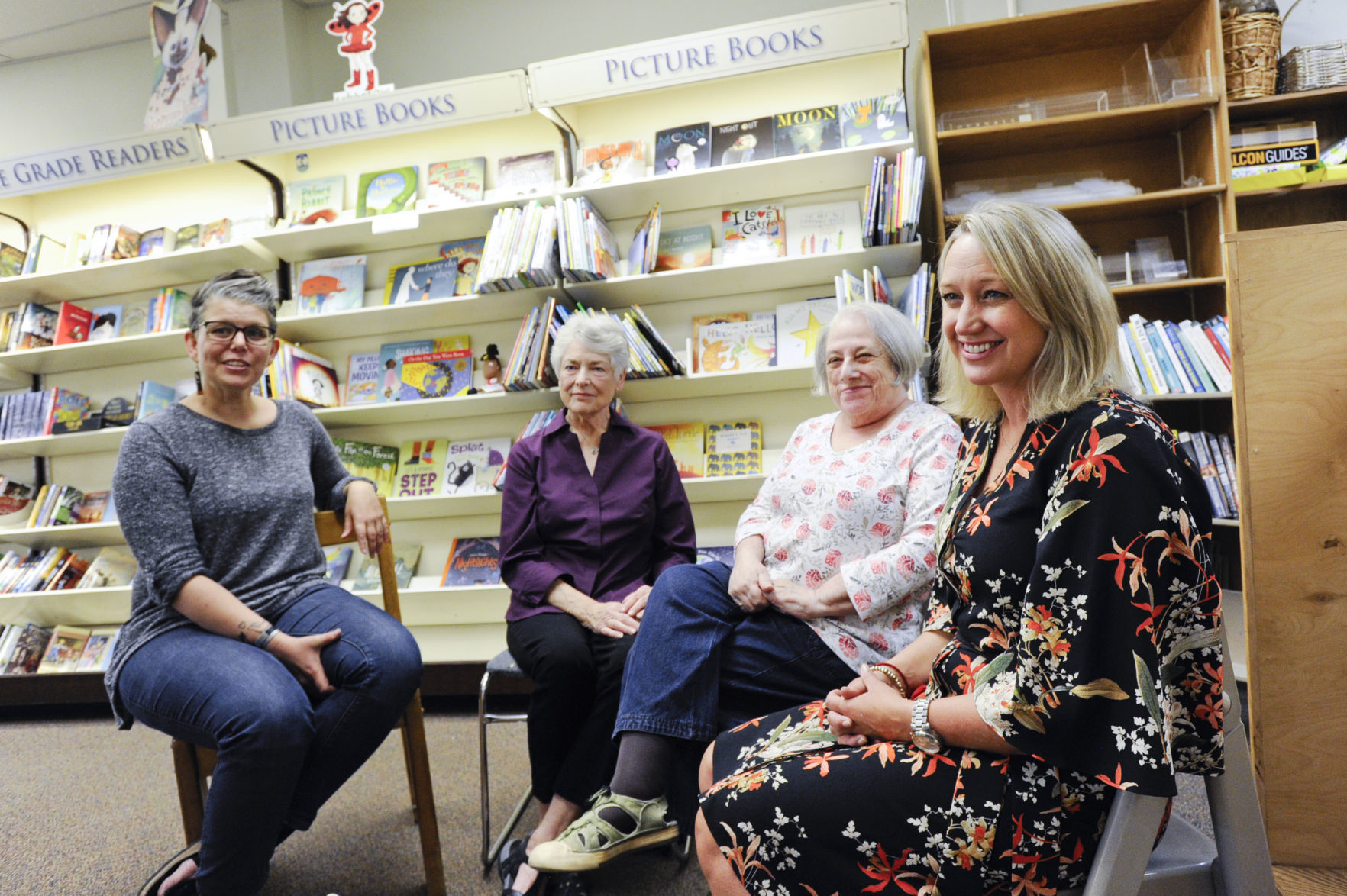 From left: new owner Chelsia Rice, original owner Judy Flanders, store manager Pam Sommer and current owner Didi Peccia
